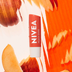 Nivea Pielęgnująca pomadka do ust Peach Shine 4.8g